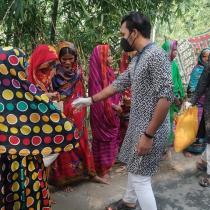 Volunteer A J Salim: Distributing.